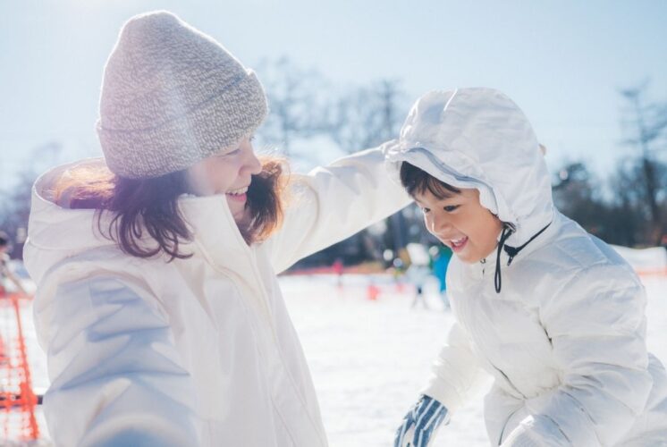 Children enjoy winter activities at Winter Wonderland at Revel Run, playing in the snow during a family friendly winter event outdoors
