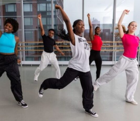 Ailey Experience Detroit at Wayne State University Students participate in Ailey Experience Detroit hip hop dance class learning signature Alvin Ailey style techniques