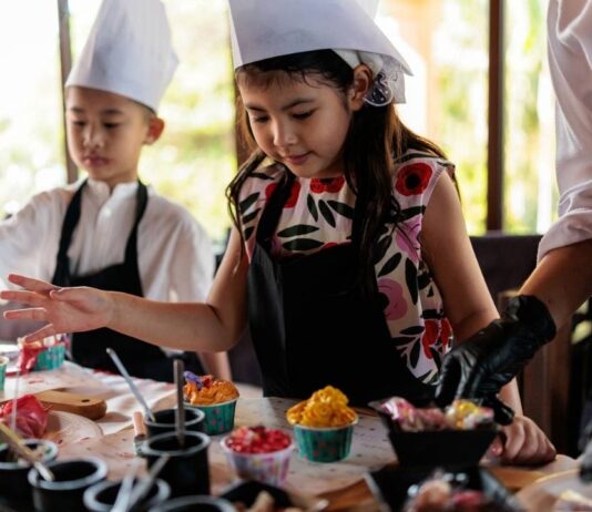 Jr bakers workshop at Blake’s Orchard and Cider Mill Kids decorating sweet treats during Jr bakers workshop at Blake’s Orchard and Cider Mill, a hands on baking activity designed for young children.