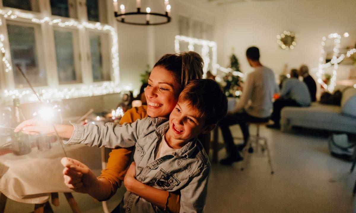 Mother Son Date Night at Heritage Hall with mom and son enjoying a festive evening together under twinkling lights