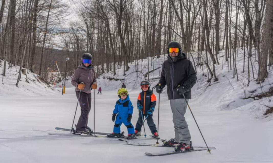 Family skiing in Northern Michigan during a winter road trip to Crystal Mountain, Boyne Mountain and Gaylord ski resorts.