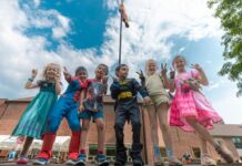 40+ unique camps keep summer exciting at Camp Mirage Kids in costumes pose together at Camp Mirage summer camp in metro Detroit, showing themed day camp fun and creativity for ages 5-14