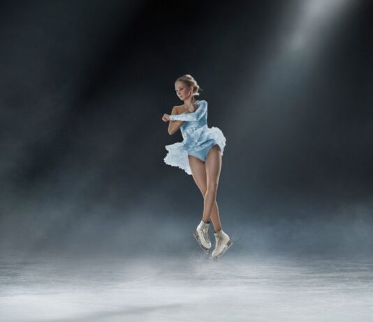 Emilea Zingas and Vadym Kolesnik welcome back meet and greet at Novi Ice Arena Young figure skater performs jump on ice at Novi Ice Arena representing Emilea Zingas and Vadym Kolesnik meet and greet event exhibition performance
