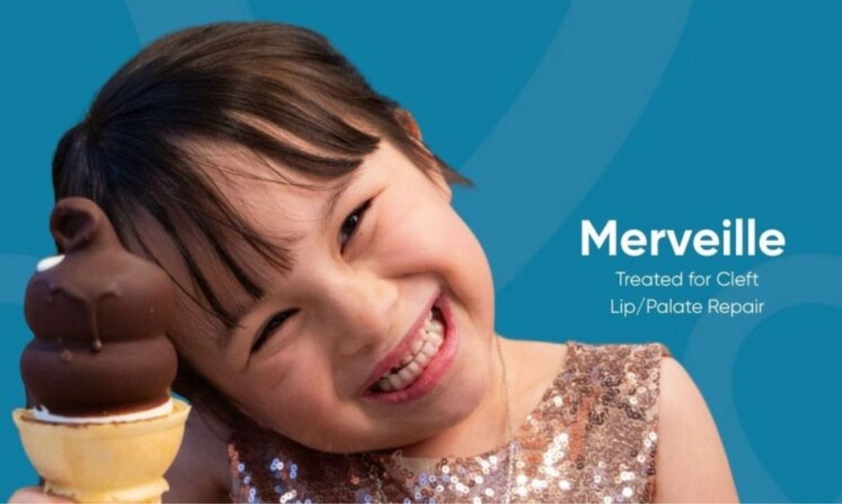 Free Cone Day at Dairy Queen West Bloomfield image of a child holding an ice cream cone for the spring giveaway event.