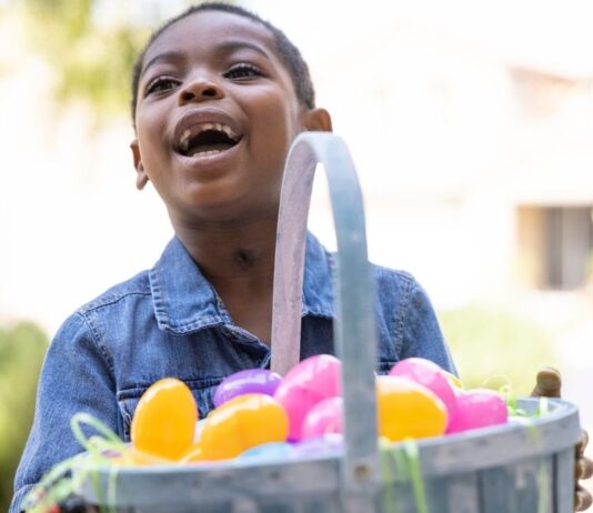 The Great Easter Egg Hunt at Lighthouse Elementary School The Great Easter Egg Hunt at Lighthouse Elementary School with child holding colorful eggs in basket during fun outdoor hunt
