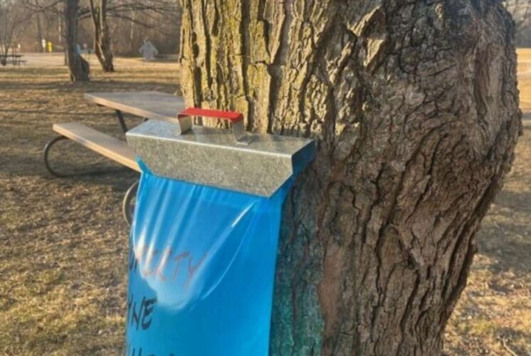 Home School Maple Sugar and Lumberjacks at Nankin Mills Interpretive Center showing maple sap collection from a tapped tree during outdoor program