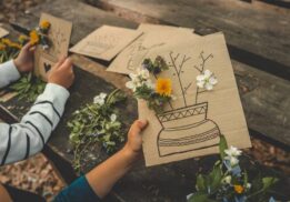 Kids create nature art with flowers and natural materials during Kids Outdoor Craft Hour at Stony Creek Metropark Nature Center