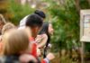 Kids explore a nature center in Lansing during spring break, enjoying outdoor family activities and fresh air in a calm setting