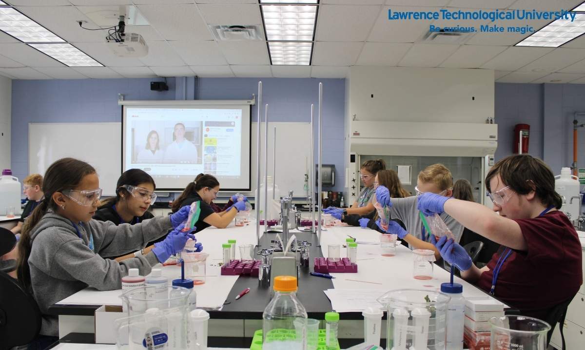 Students in a STEM summer camp at Lawrence Technological University conduct hands-on science experiments in a lab setting