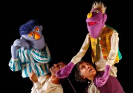 Michigan Wildlife Puppet Play at Nature Center image with colorful puppets and performers during an interactive children's show.