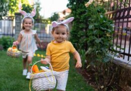 Kids enjoy spring fest lunch with bunny Saline Recreation Center event while carrying Easter baskets during a fun egg hunt outdoors