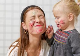 Baby and toddler paint party westacres activity center messy art fun with caregiver and child enjoying hands on painting activity together