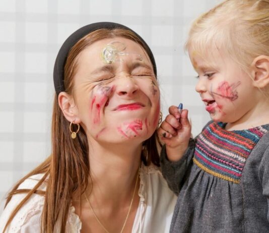 Baby and toddler paint party westacres activity center messy art fun with caregiver and child enjoying hands on painting activity together