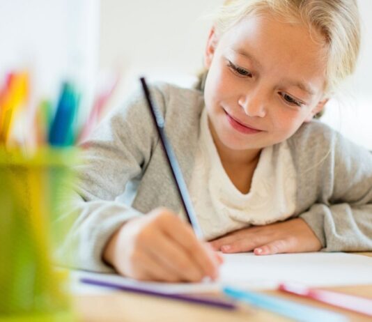 Drawing in the Galleries at Detroit Institute of Arts Drawing in the galleries detroit institute of arts kids art activity with child sketching using pencil during creative museum experience