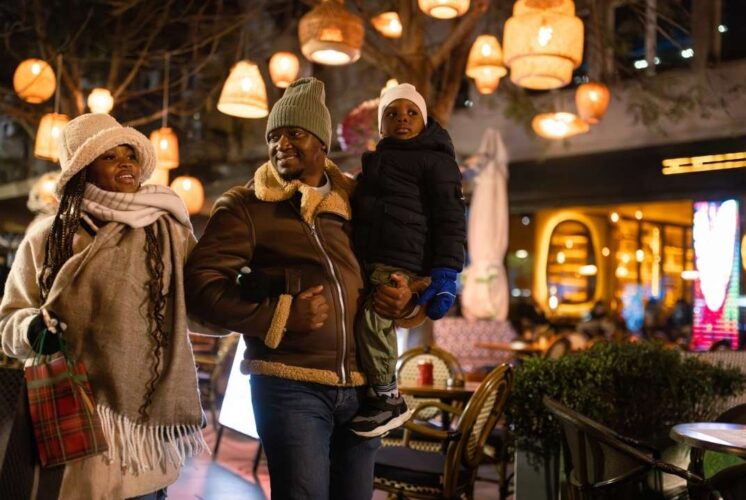 Foolmoon main street ann arbor family lantern night event with glowing lights and families enjoying illuminated parade and festive atmosphere