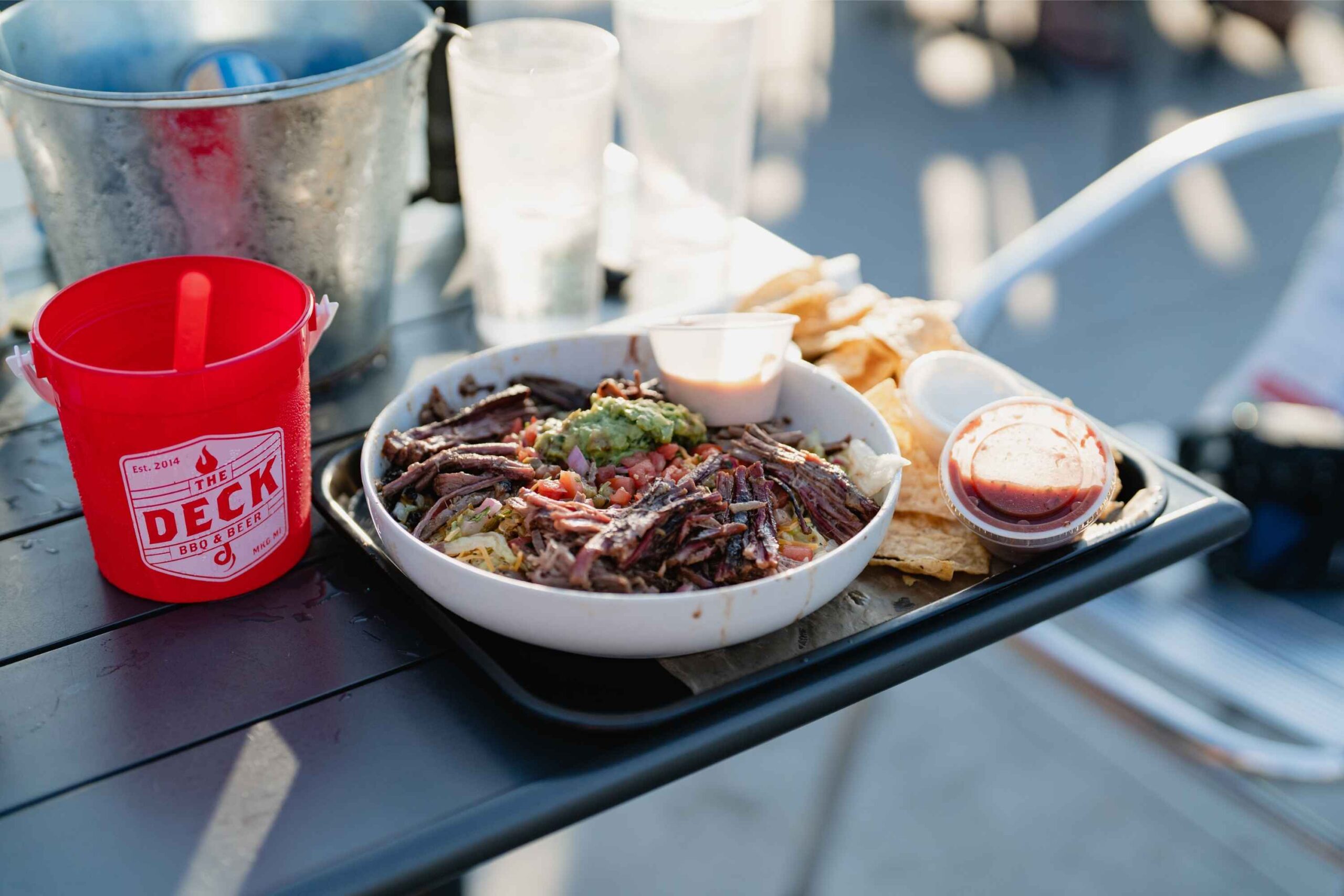 BBQ nachos with pulled pork and chips at The Deck in Muskegon, a popular family friendly lakeside restaurant for casual dining
